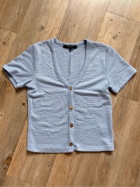 Light Blue Textured V-Neck Button Front Tee